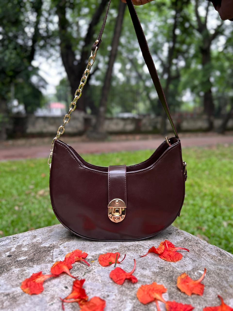 WhatsApp Image 2026-05-21 at 8.49.51 P Glossy Moon Shape Imported Quality Shoulder Bag for Women - Image 1